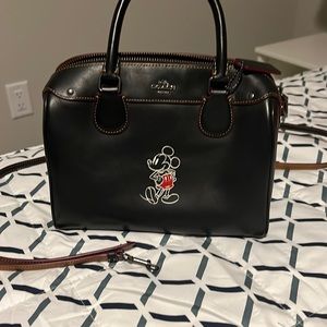 Black coach x Disney handbag. Lightly used. Comes with removable strap.